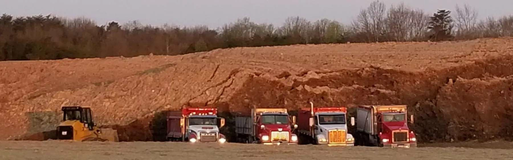 Contaminated soil staged for transport off-site